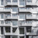 Wohnungen in den Silos mit einer Fassade aus galvanisiertem Stahl von COBE Architects

